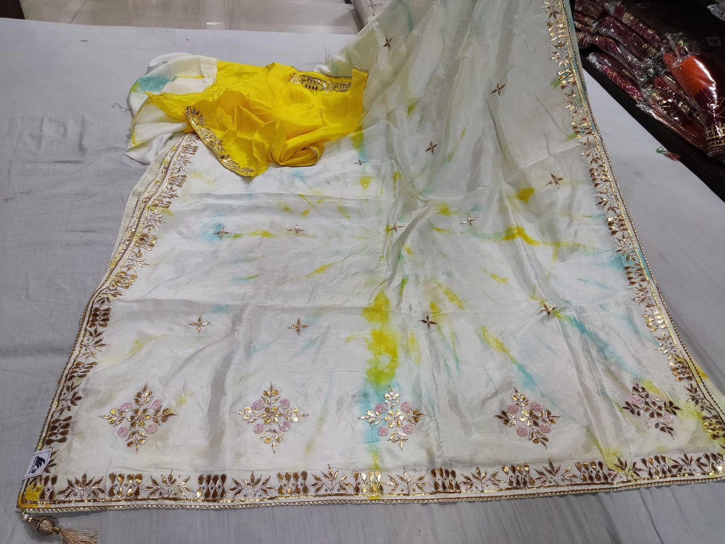 White Saree with Sky Blue & Lime Shibori Accents and Ornate Gota Border