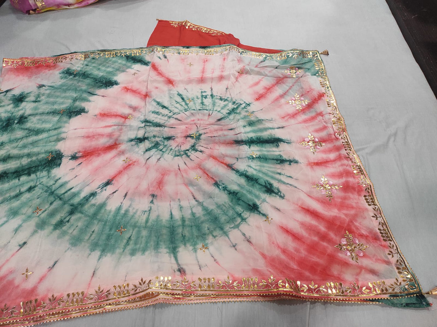 Forest Green & Coral Red Spiral Tie-Dye Saree with Ornate Gota Work