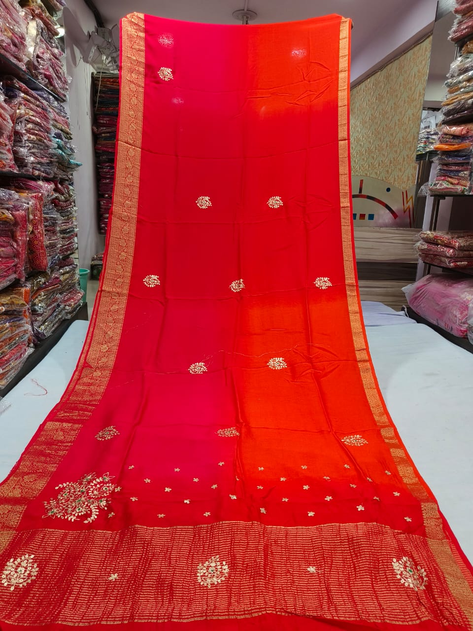 pink and bright red Banarasi Bandhani saree